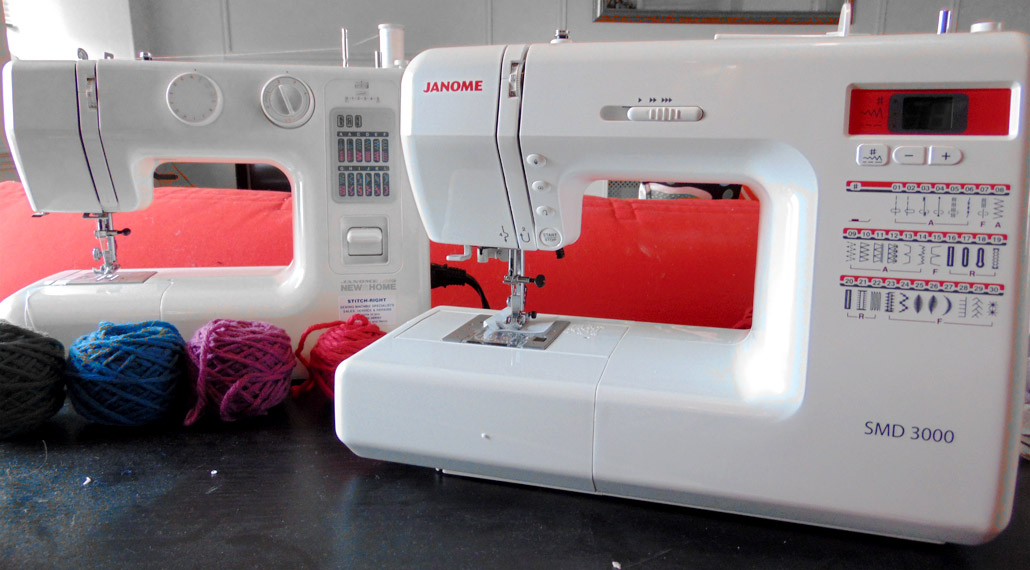 old mechanical janome sewing machine next to new computerised sewing machine